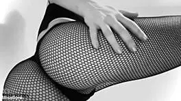Fishnet-clad ass teases feet in black and white!