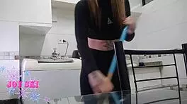 Tattooed maid rubs against washing machine, teasing nipples and cock