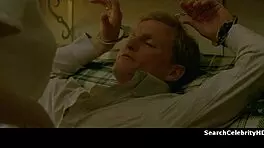 alexandra daddario strips naked on the sofa, gets handcuffed in bondage scene.