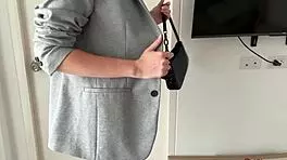 Cute redhead in pantyhose moans while trampling bound body.