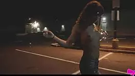 Just chilling topless outdoors with Honey Gold and Dakota Marr flashing sparklers.
