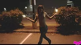 Just chilling topless outdoors with Honey Gold and Dakota Marr flashing sparklers.