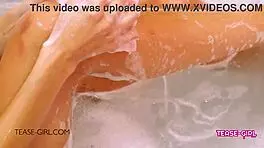 Sexy brunette teen 18+ student in a bath