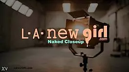 the brunette milf reveals her body on the sofa