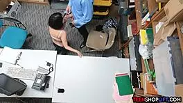 teen shoplifter gives a reluctant blowjob to the security guard in the back room