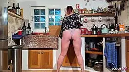 german curvy redhead with huge natural boobs banged in kitchen after banana play