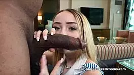 Damn! Blonde hottie tests huge black dick on cam!