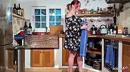 german curvy redhead with huge natural boobs banged in kitchen after banana play