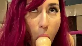 i'm a red haired teen beauty dancing sexy striptease then setting up sex machine with dildo in my mouth