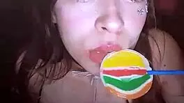 bonneyuwu sucking on a lollipop, looking cute and beautiful as a teen