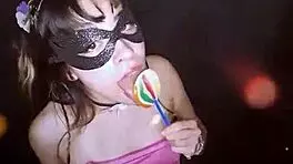 bonneyuwu sucking on a lollipop, looking cute and beautiful as a teen