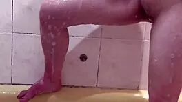 beautiful girl takes soapy bath, foam on her wet pussy 😍