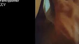 young stepdaughter in lingerie on sofa