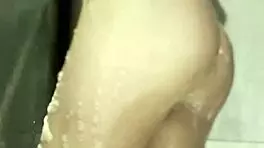 Pretty Young Amateur Plays Solo In Shower, Touching Hairless Legs And Soft Tits