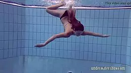 Lucy says, 'Watch me take off this bikini in the pool.'