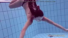 Lucy says, 'Watch me take off this bikini in the pool.'