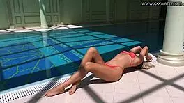 very hot russian pornstar mary kalisy bathing in bikini by the pool, getting nude outdoors