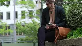 submissive business woman blindfolded and exposed in public