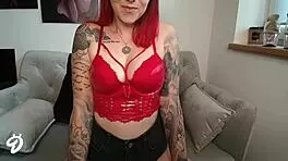 red fetish outfit with pierced nipples and ass