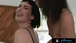 Olive and Alexis fucking with strap-on.