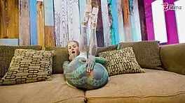 Tattoo girl feels pleasure in solo anal play with big dildo in sexy fishnets