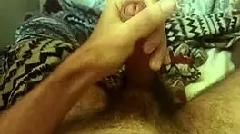 Handsome Brazilian Guy Masturbates Lying Down with Huge Cock and Spread Legs