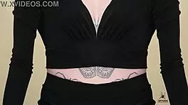 Check out Kit Summers in her two-piece black outfit with deep plunging neck!