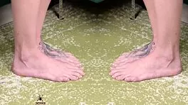 Check out Kit Summers in her two-piece black outfit with deep plunging neck!