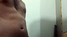 I'm undressing for masturbation in the bathroom.