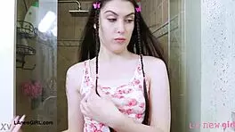 Cute brunette with long hair took a shower