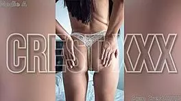 Nanie strips out of her thong revealing sweet tight pussy in backstage striptease