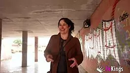 Emmita Smile flashes her huge tits to seduce that young guy in public.