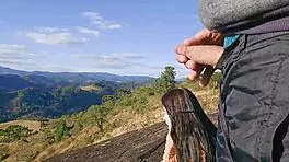 Tourist guide reveals his big cock to the pretty visitor on the mountain.