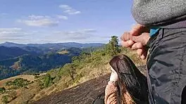 Tourist guide reveals his big cock to the pretty visitor on the mountain.