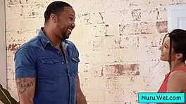 Hot masseuse Maya Woulfe rubs her black client with nuru gel!