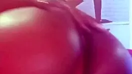 A sexy teen brunette Latina sensualizes for her fans in an ebony performance