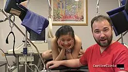 I scream as Raya Nguyen slaps my shaved pussy with latex gloves and toys