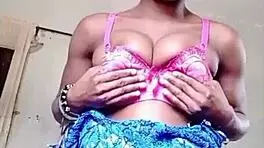 Naughty teen teases with striptease and moans while masturbating solo