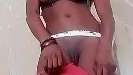 Naughty teen teases with striptease and moans while masturbating solo