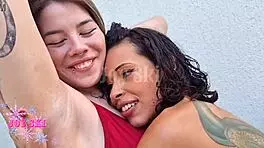 two latina girls explore lesbian fun outdoors with shaving and kissing