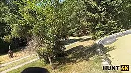 A hunter convinces a young European lady to give a blowjob outdoors, cheating on her husband right away