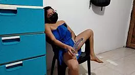 Hey, check out this young woman pleasuring herself with a dildo right after her steamy shower!