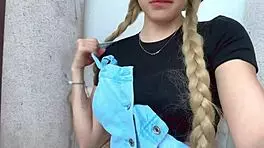 Cute blonde girl rubs her clit and squirts outdoors in garden