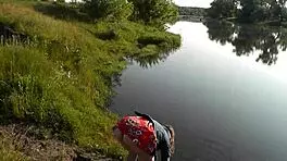 Cute brunette student flashes at wild beach in short dress