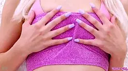 radiant blonde girl casually shows off her sexy body in a photoshoot