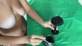 Tell me, how does this mature woman milk her partner's balls?