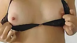 Latina shows big tits and ass in lingerie