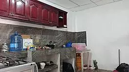 A young latina prepares a very tasty dinner at home