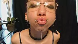 Goth Girl Applies Lipstick and Drools Playfully