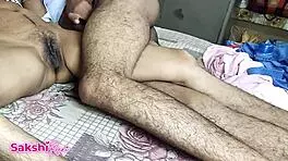 Romantic Hindi video of couple's intimate home encounter featuring passionate moments and dirty talk.